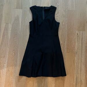 Chic Black Sleeveless Mini Dress gently worn
